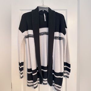 Cream and white open faced sweater